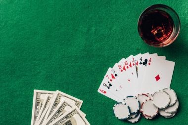 Live Andar Bahar dealer with cards and piles